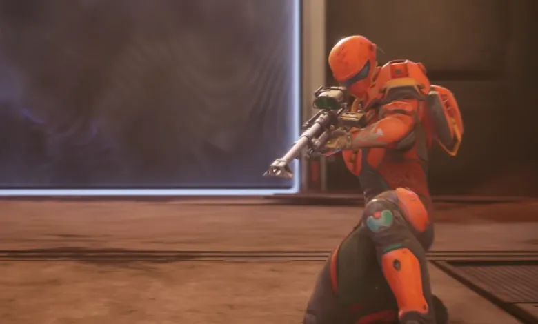 Orange armored figure aims rifle in a futuristic setting.