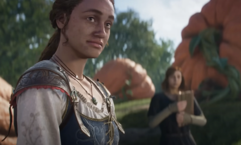 Woman in medieval attire stands in a pumpkin patch.