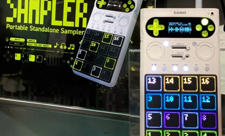 Casio portable sampler with illuminated buttons and display screen.