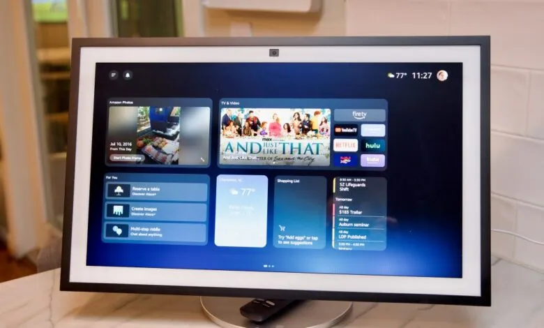 Amazon Echo Show 15 displays various apps and information on a marble countertop.