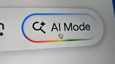 AI Mode button on a screen with a magnifying glass icon and rainbow progress bar.