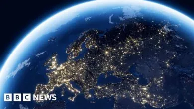 Earth at night showing Europe and city lights from space.