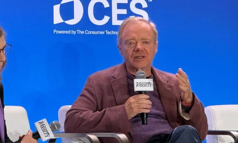 Anthony Wood speaking at CES conference with Variety microphone.