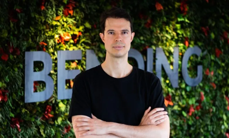 Luca Ferrari, CEO of Bending Spoons, poses with arms crossed.