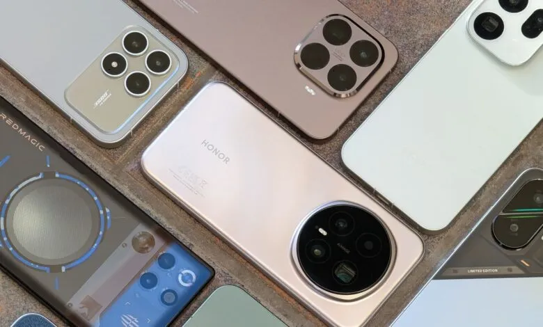 Several smartphones arranged to showcase their rear camera designs.