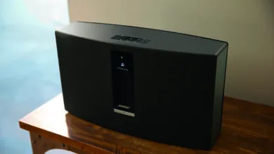 Bose SoundTouch 30 Series III speaker on a wooden table.