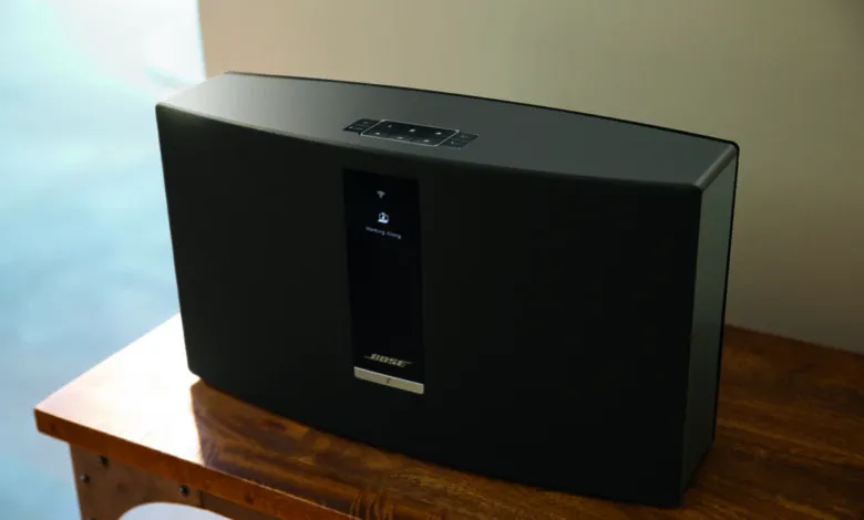 Bose SoundTouch 30 Series III speaker on a wooden table.