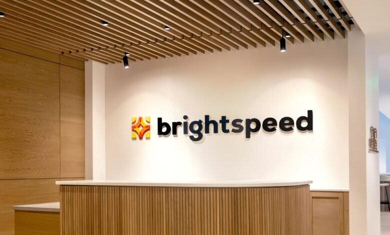Brightspeed logo displayed in a modern office reception area.