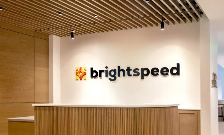 Brightspeed logo displayed in a modern office reception area.