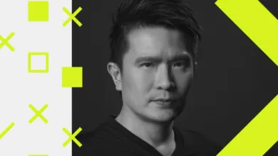 Portrait of Min-Liang Tan, CEO of Razer, in black and white.