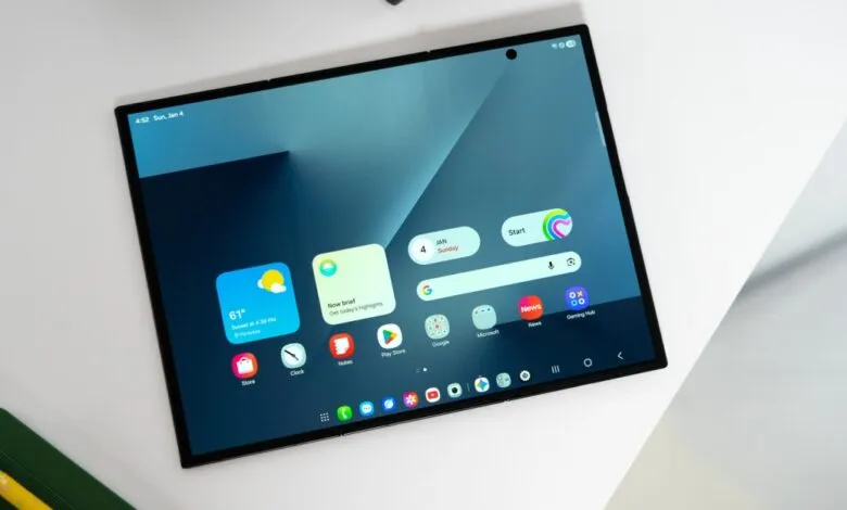 Tablet displaying home screen with widgets and app icons.