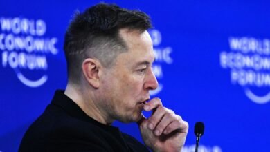 Elon Musk at the World Economic Forum, looking thoughtful.