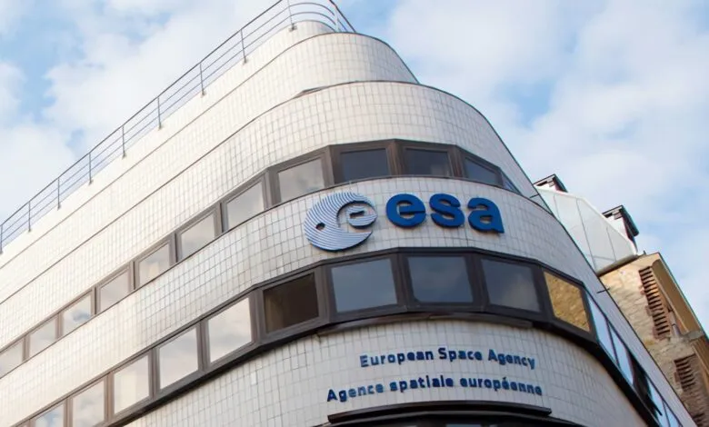 European Space Agency (ESA) building with logo against a blue sky.