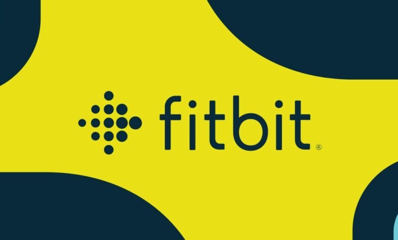 Fitbit logo on a bright yellow background with blue accents.