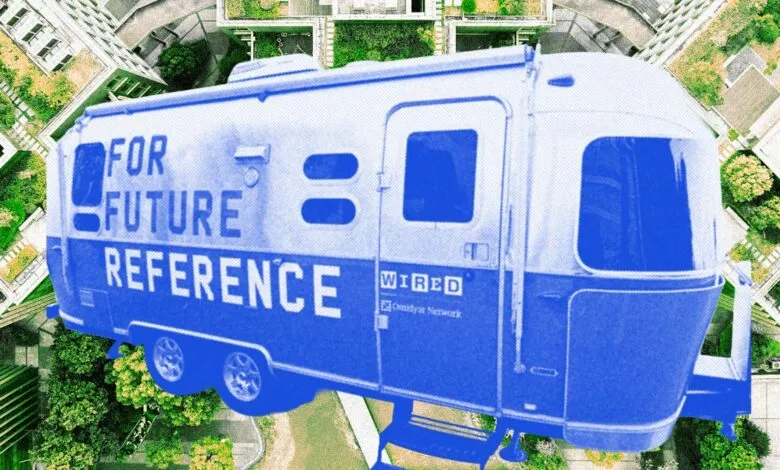Blue and white trailer with 'For Future Reference' text, aerial view.