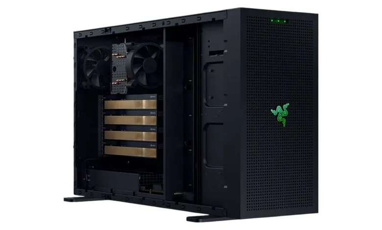 Open Razer PC case showing internal components and cooling system.