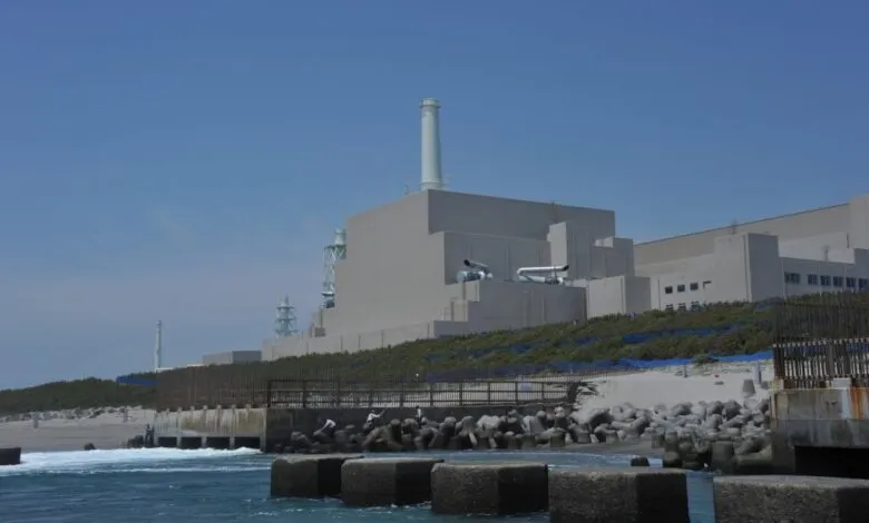 Hamaoka Nuclear Power Plant complex viewed from the ocean.
