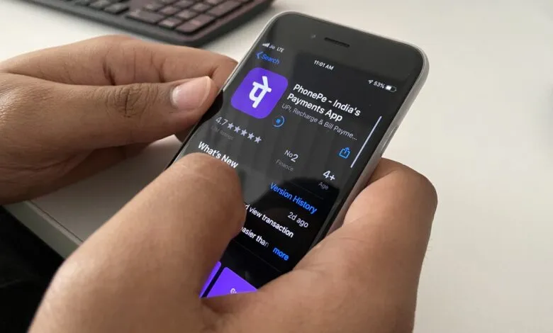 Phone screen showing the PhonePe app in the app store.