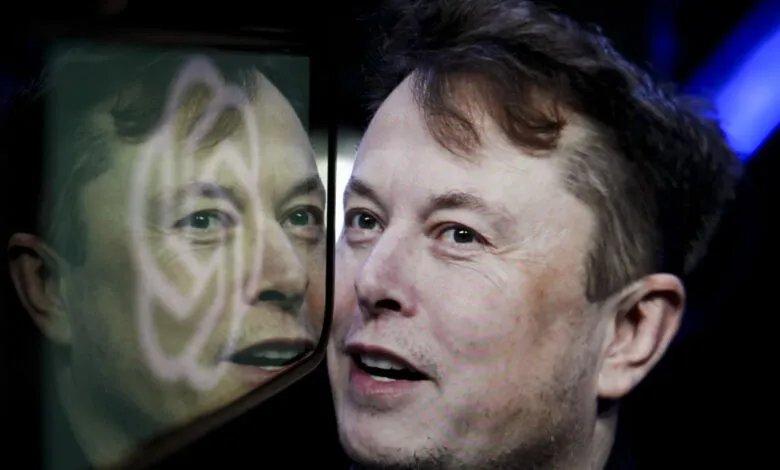 Close-up of Elon Musk with his reflection in a screen.