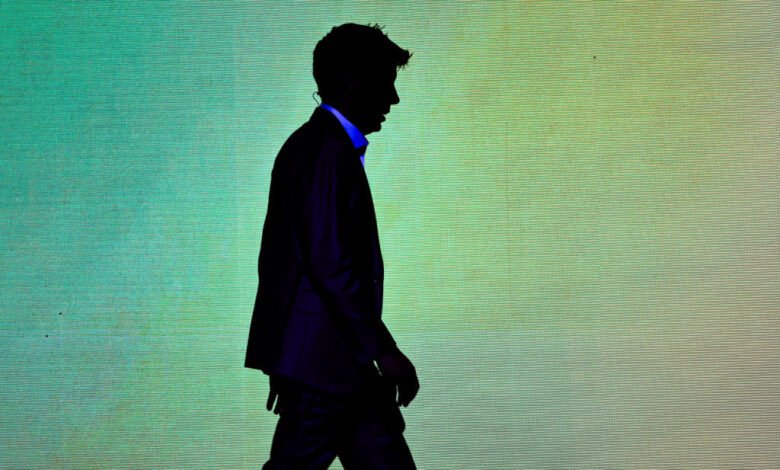 Silhouette of Sam Altman walking against a textured green backdrop.