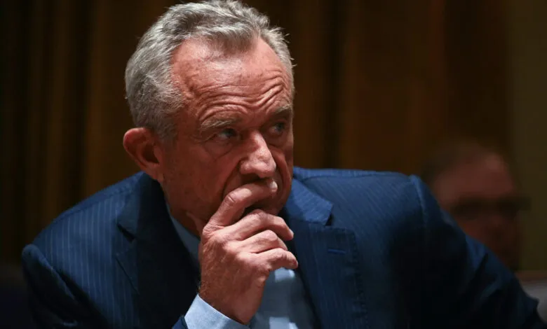 Robert F. Kennedy Jr. in thought, hand to mouth.