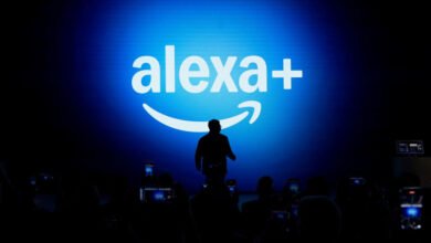 Silhouette of person on stage in front of Alexa+ logo.