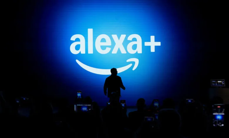 Silhouette of person on stage in front of Alexa+ logo.