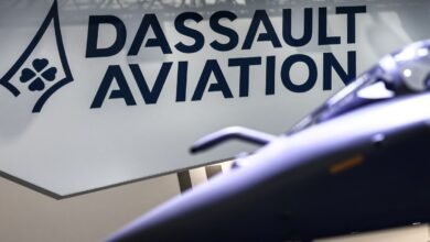 Dassault Aviation logo with a blurred fighter jet model in the foreground.