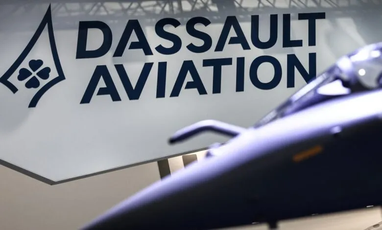 Dassault Aviation logo with a blurred fighter jet model in the foreground.