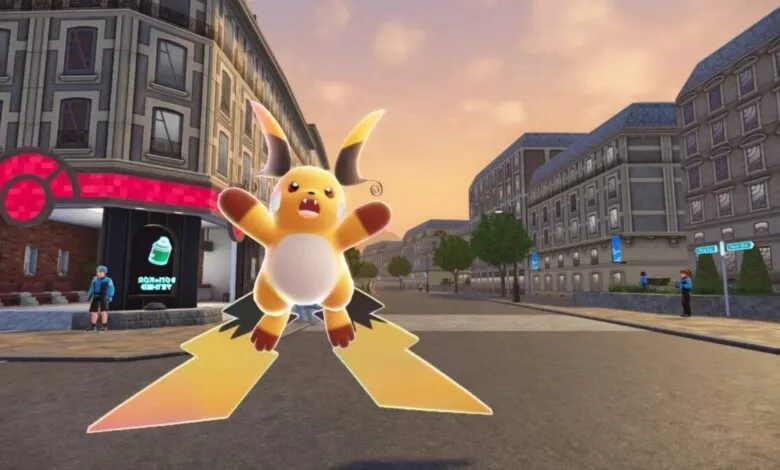 A Raichu character floats in a city street with buildings.
