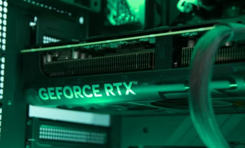 Close-up of a GeForce RTX graphics card inside a computer case.