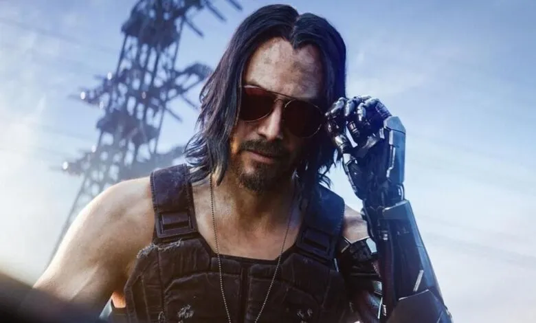 Keanu Reeves as Johnny Silverhand in Cyberpunk 2077, robotic arm visible.