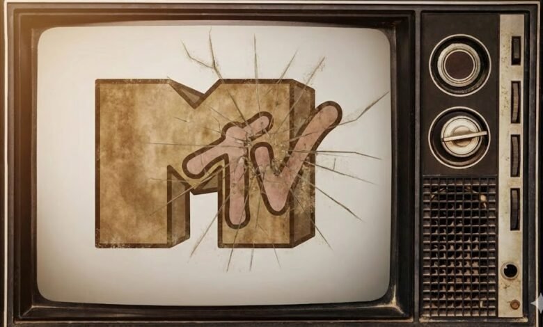 Vintage TV with cracked screen displaying the MTV logo.