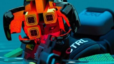 Futuristic character with glowing red eyes and complex helmet.