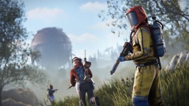 Character in hazmat suit holds gun, with others and large sphere in background.