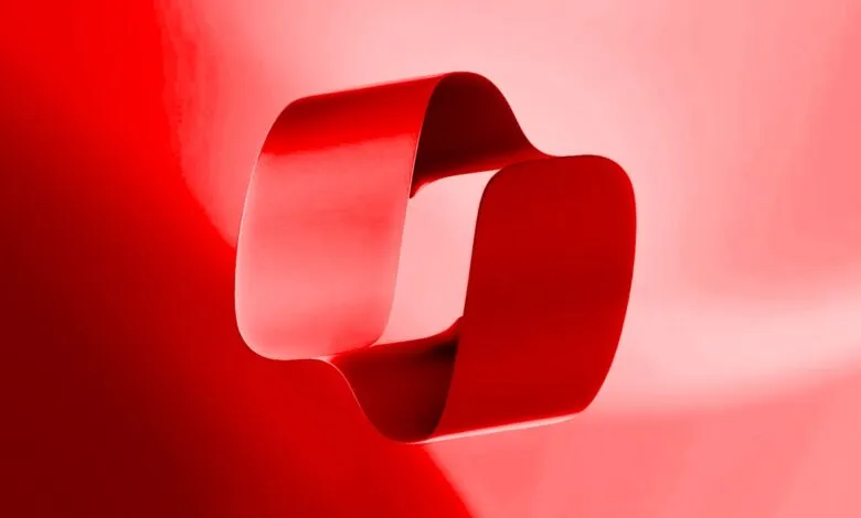 Red Microsoft Copilot logo against a red gradient background.
