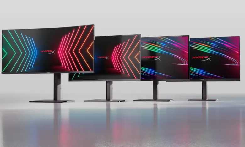 Four HyperX gaming monitors displaying colorful, dynamic arrow designs.
