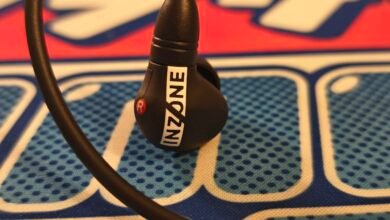 Close-up of Inzone gaming earbuds with 'R' marking on the right earbud.