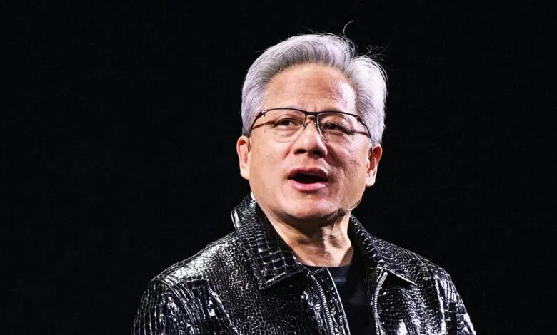 Jensen Huang, Nvidia CEO, wearing a black jacket and glasses.