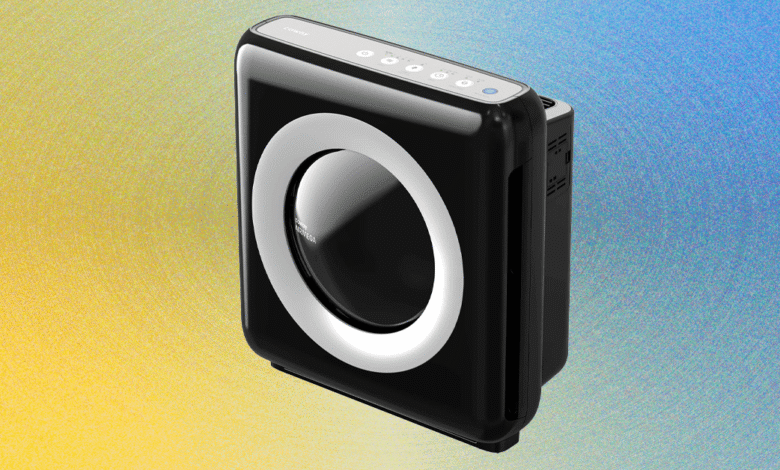 Coway Airmega air purifier with sleek black design.