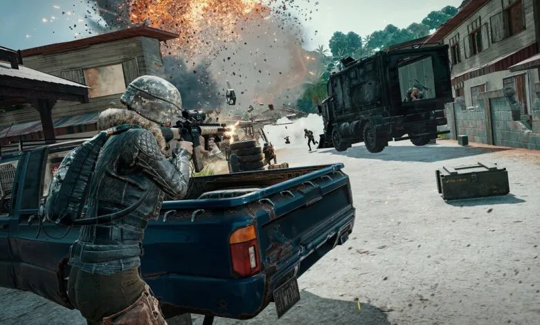 Character in tactical gear fires weapon amidst explosion in PUBG game.