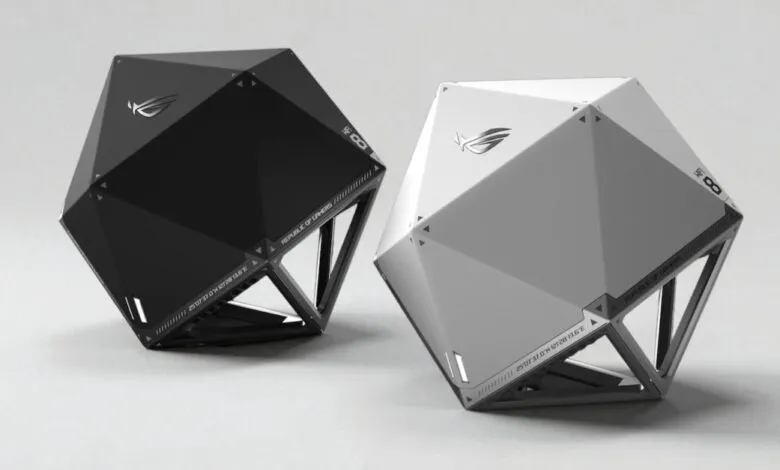 Two ROG NeoCore WiFi 8 concept routers, one black and one white, on a white surface.