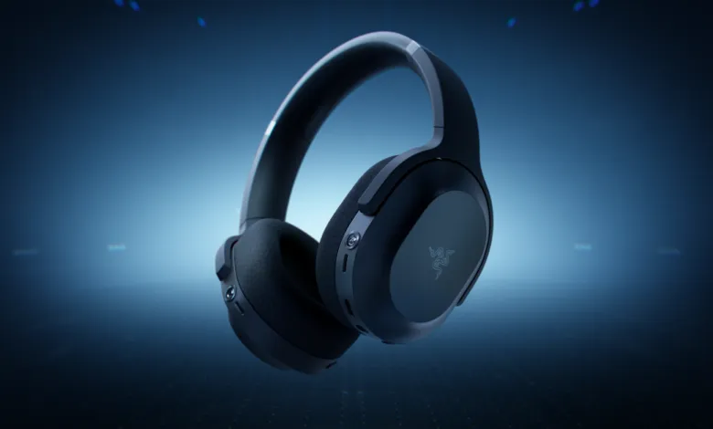 Close-up of black Razer headphones floating against a blue gradient background.