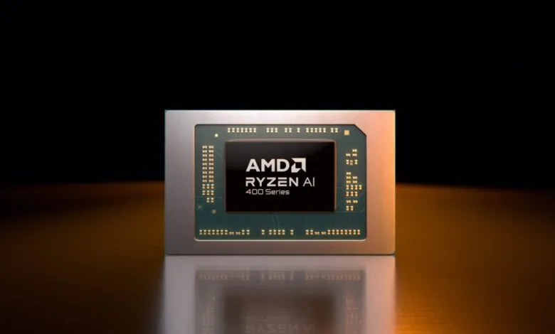 AMD Ryzen AI 400 Series processor chip on reflective surface.