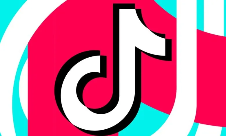 TikTok logo in white, black, pink, and cyan.