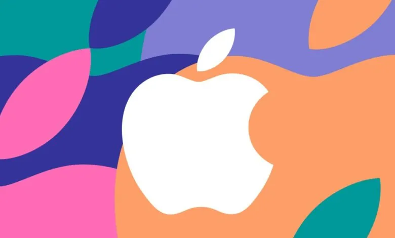 Apple logo in white against colorful abstract shapes.