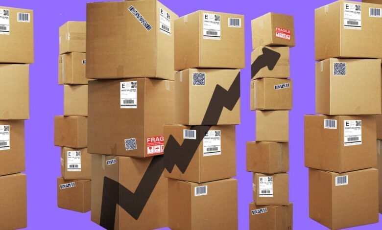 Stacks of cardboard boxes with an upward trending arrow overlayed.