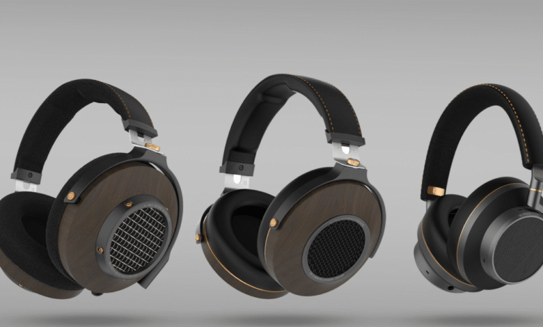 Three Klipsch headphones with wood and metal accents.