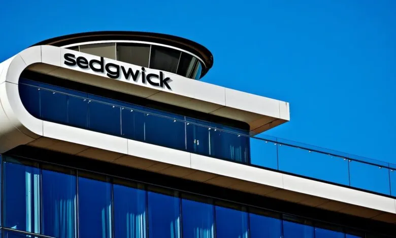 Close-up of the Sedgwick building with modern architecture and blue glass.