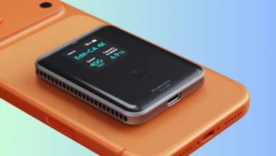 Planck StudioSSD on orange phone showing 6.9TB capacity and 40G bps speed.